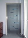 Porta in vetro con mantovana